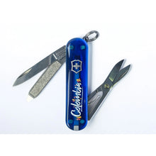 Load image into Gallery viewer, Navaja Victorinox Classic SD Orgullo Tricolor Edición Mundial, Azul translucida